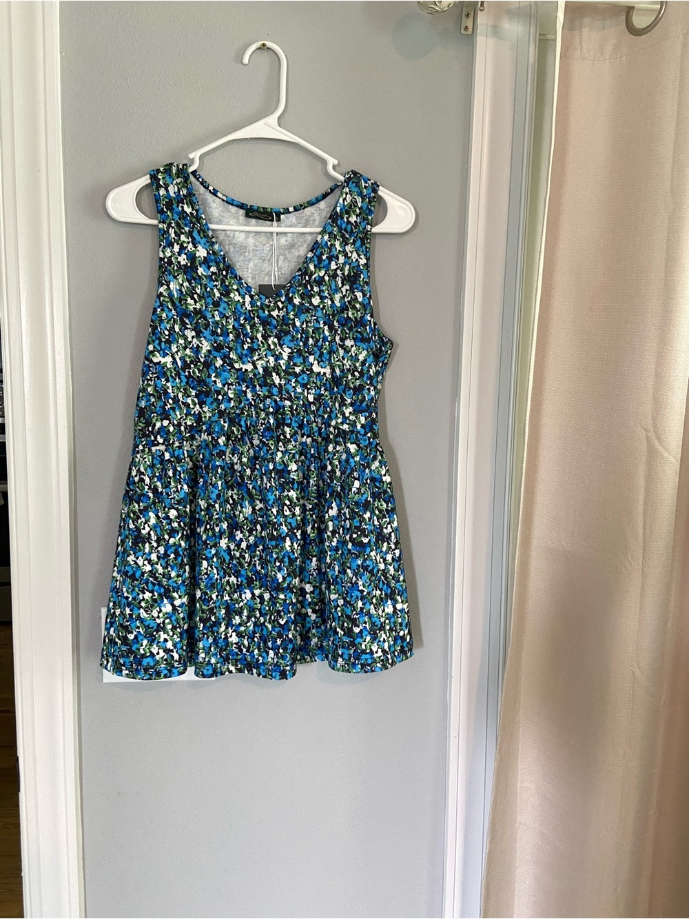Blue Floral Sleeveless Peplum Top - Women's